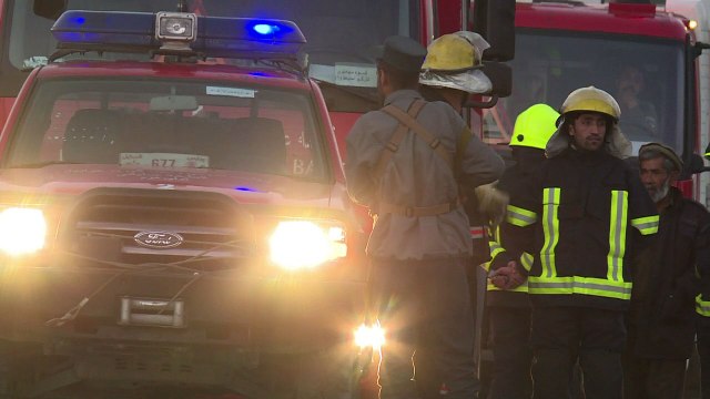 Twin Taliban blasts near Afghan parliament kill dozens