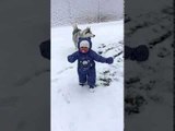 Cute Toddler Plays in the Snow for the First Time