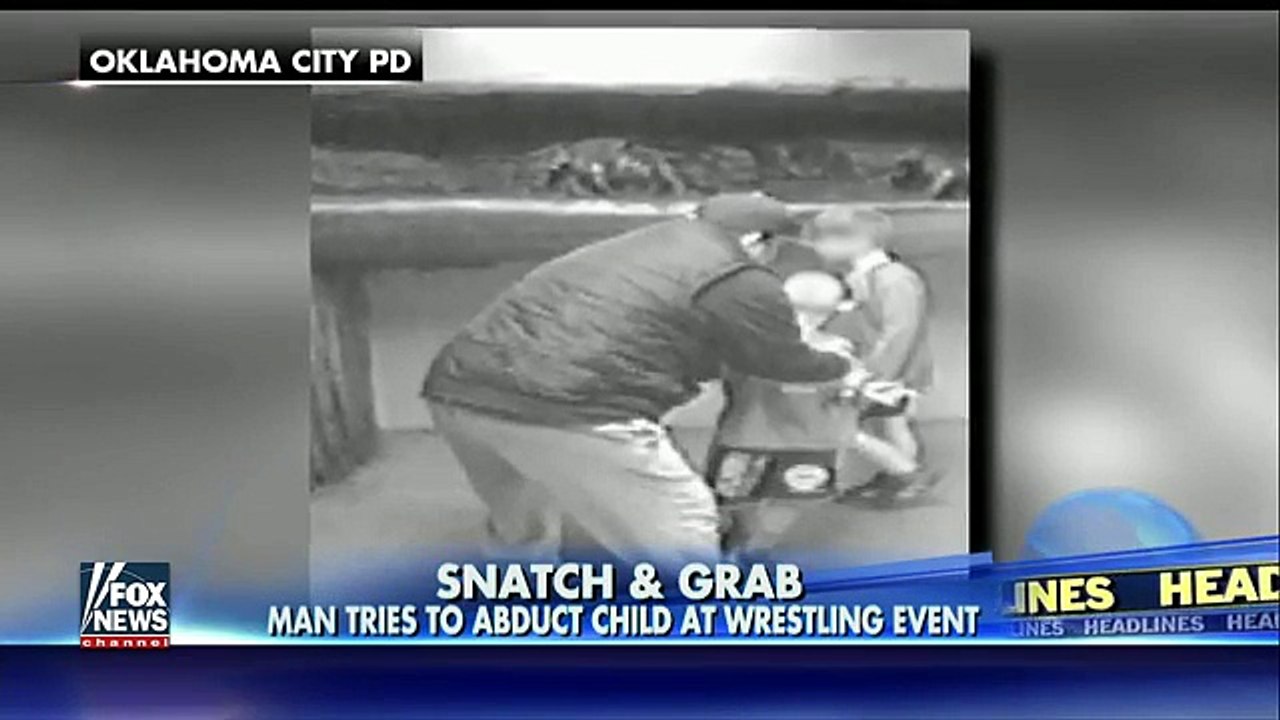 Photos show man trying to abduct child at wrestling event