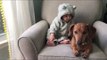 Adorable Baby Uses Dachshund Puppy as Tissue