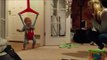 Adorable Toddler Jumps for Joy With Mother