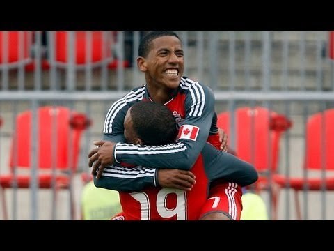 Reggie Lambe (Toronto FC) crushes goal past Sean Johnson (Chicago Fire)