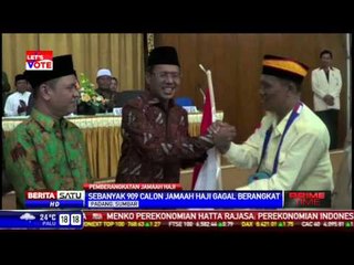 Descargar video: 909 Calon Jemaah Haji dari Padang Gagal Berangkat