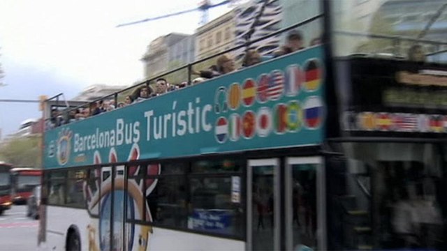 Touristen verwöhnen Spanien