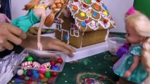 Gingerbread house DECORATING! ELSA, ANNA toddlers use candies, sprinkles, royal icing!