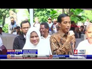 Jokowi Nyoblos Bareng Istri di TPS Taman Suropati