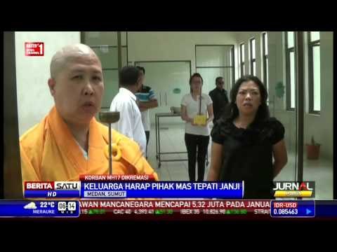 Prosesi Kremasi Jenazah Korban MH17 Diwarnai Isak Tangis