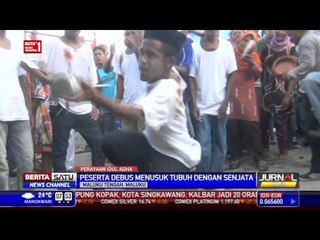 Abda'u, Tradisi Berebut Bendera Pusaka di Tulehu