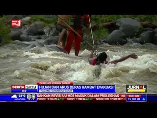 Скачать видео: Hujan dan Arus Deras Hambat Evakuasi Korban Terjebak Banjir