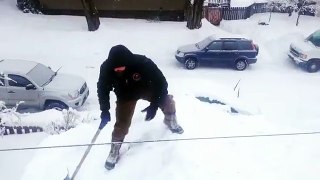 Bend Oregon Clearing Snow Off Roof