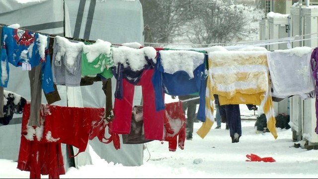 Helpless refugees freezing in cold-hit Greece.