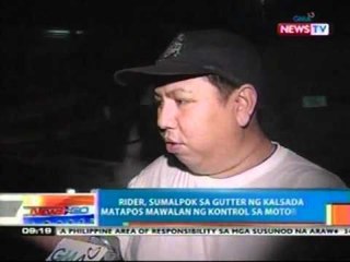 NTG: Rider, sumalpok sa gutter sa EDSA matapos mawalan ng kontrol sa motorsiklo (021412)