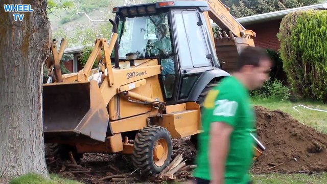 Case 580 L Backhoe moving, construction machine