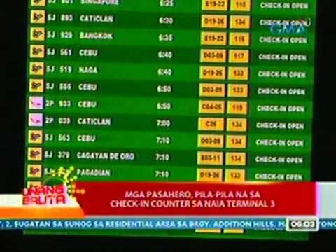 UB: Mga pasahero, pila-pila na sa check-in counter ng NAIA Terminal 3 (040312)