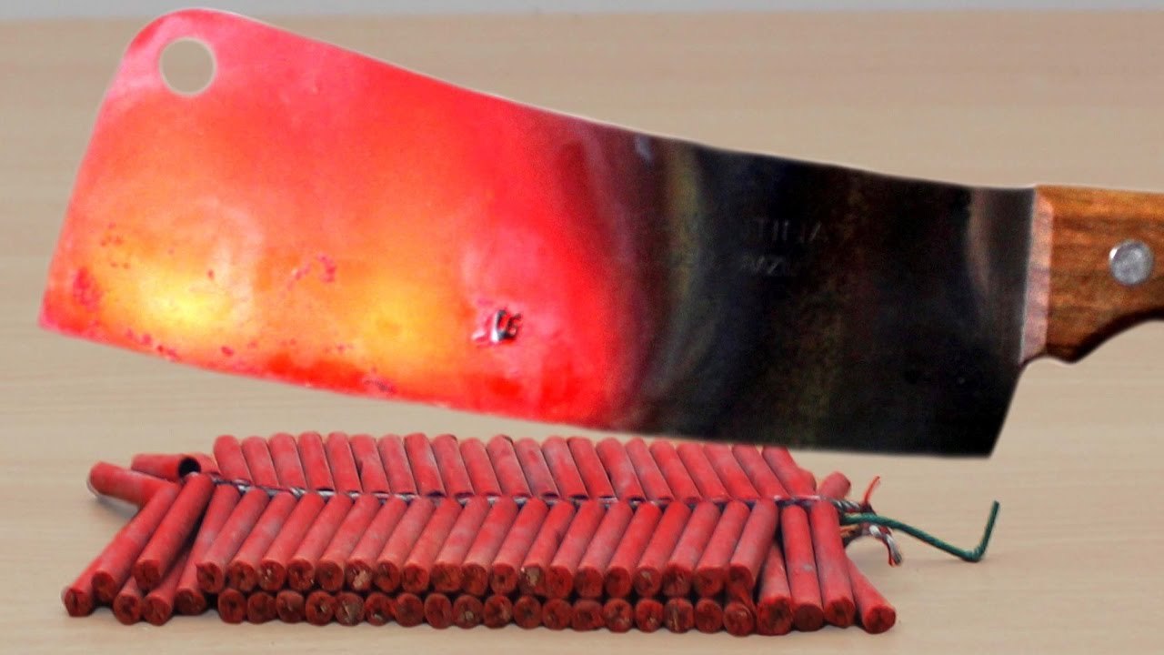 EXPERIMENT Glowing 1000 degree MEAT CHOPPER vs 100 FIRECRACKERS