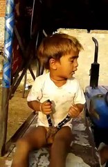 what this little kid is doing.....!!!!!