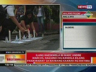 BT: Ilang kaeskwela ni Marc Marcos, nagsindi ng kandila sa pakikiramay sa naiwang kaanak niya