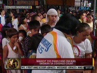 24 Oras: Mahigit 200 pamilya inilikas, siksikan sa covered court