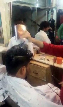 India Barber Uses Fire To Give Haircuts