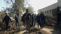 Iraqi forces fight IS at Mosul University