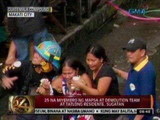 24 Oras: Ilang residente, armado pa ng   itak sa pakikipag-matigasan sa   demolition team