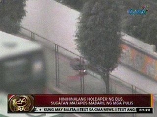 Télécharger la video: 24Oras: Hinihinalang holdaper ng bus, sugatan matapos mabaril ng mga pulis