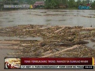 24Oras: Tone-toneladang troso, inanod sa Sumilao River