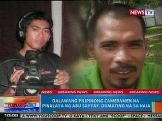 NTG: 2 Pinoy cameramen na pinalaya ng Abu Sayyaf, dumating na sa NAIA