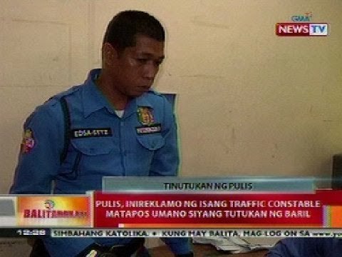 BT: Pulis, inireklamo ang isang traffic constable nang tutukan ng baril