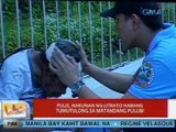 UB: Pulis, nakunan ng litrato habang tumutulong sa matandang pulubi sa Davao City