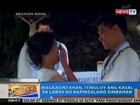NTG: Magkasintahan, itinuloy ang kasal sa labas ng napinsalang simbahan sa Bohol