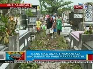Mga bumibisita sa binahang sementeryo sa Dagupan City, kanya-kanyang diskarte sa pag-iwas sa tubig