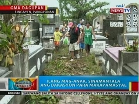 Mga bumibisita sa binahang sementeryo sa Dagupan City, kanya-kanyang diskarte sa pag-iwas sa tubig
