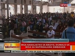 BT: Mga nakaligtas sa bagyo, dumalo sa misa sa napinsalang simbahan sa Leyte