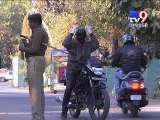 Cops flout traffic rules, don't wear helmet - Tv9 Gujarati