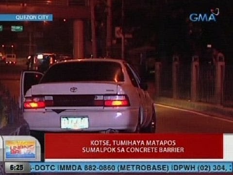 UB: Kotse, tumihaya matapos sumalpok sa concrete barrier sa QC