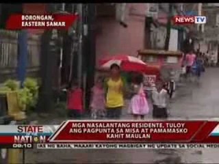 Mga residenteng nasalanta ng Yolanda, tuloy ang pagpunta sa misa at pamamasko kahit maulan