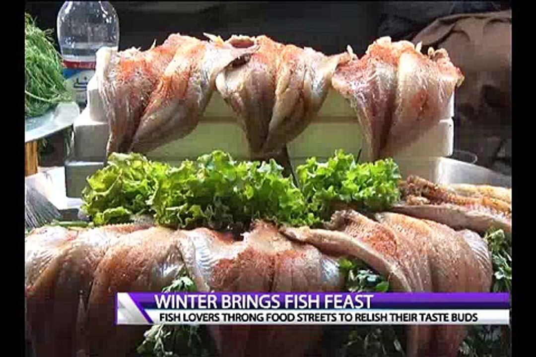 Enjoying Fish Feast In Winter and Cold Weather