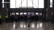 American football fans rush through the doors as AT&T Stadium opens