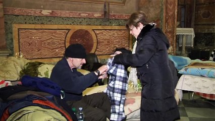 Rome church becomes homeless shelter in freezing weather