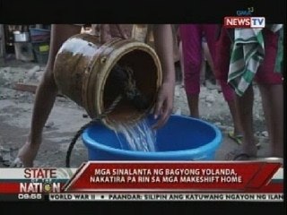 Скачать видео: Mga sinalanta ng bagyong Yolanda, nakatira pa rin sa mga make shift home