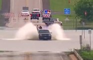 Truck Owner Thinks He Can Cross Flooded Road