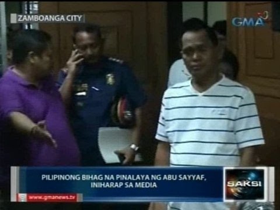 Saksi: Pilipinong bihag na pinalaya ng Abu Sayyaf, iniharap sa media