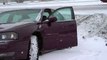 Minnesota Icy Road Spinout Snow Storm: Car Spins Out of Control in a Ditch !