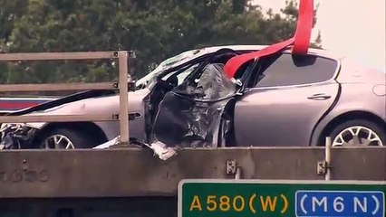 Crash Car Left Hanging From M6 Bridge