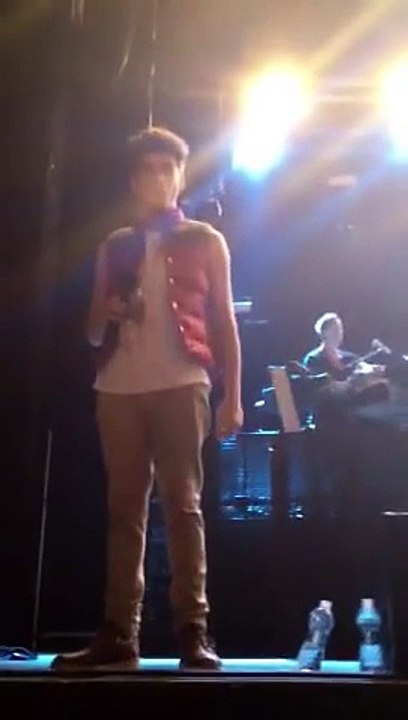 Zayn taking my friends phone on stage!! -