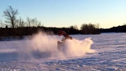 Скачать видео: T-Rex Doing Frozen Ice Donuts on ATV! Show Us Your ATV Videos & Win!