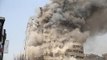 High-rise shopping mall collapses in central Tehran dozens of firefighters trapped or killed