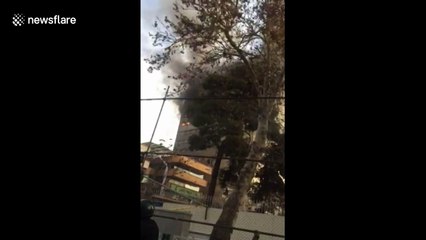 Many feared dead as high-rise building on fire in Tehran collapses