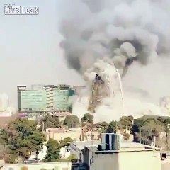 Explosion and the collapse of the commercial tower in Iran